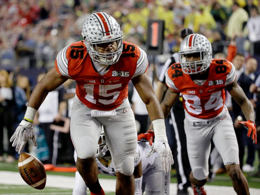 PHOTO: Ohio State's Ezekiel Elliott (15) celebrates after a nine-yard touchdown run during the second half of the NCAA college football playoff championship game against Oregon, Jan. 12, 2015, in Arlington, Texas.