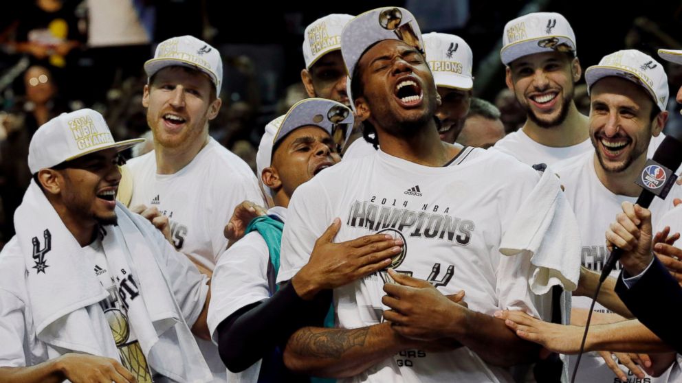 PHOTO: San Antonio Spurs forward Kawhi Leonard, third from right, celebrates after Game 5 of the NBA basketball finals against the Miami Heat, June 15, 2014, in San Antonio. Leonard was named the series' Most Valuable Player.