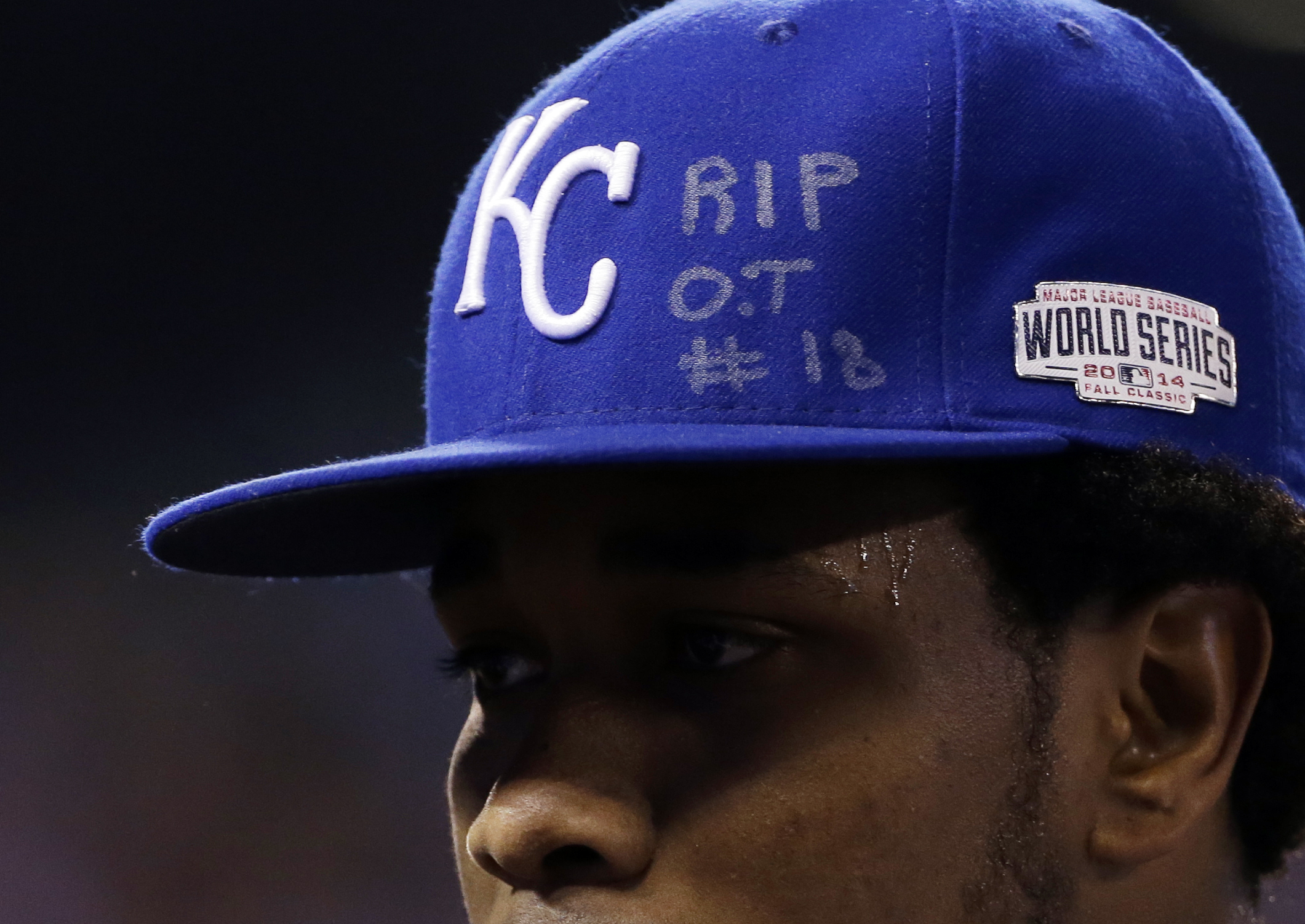 Kansas City Royals pitcher Yordano Ventura has an RIP O.T. #18 on his hat as he walks off the field during the first inning of Game 6 of baseball's World Series against the San Francisco Giants, Oct. 28, 2014, in Kansas City, Mo.