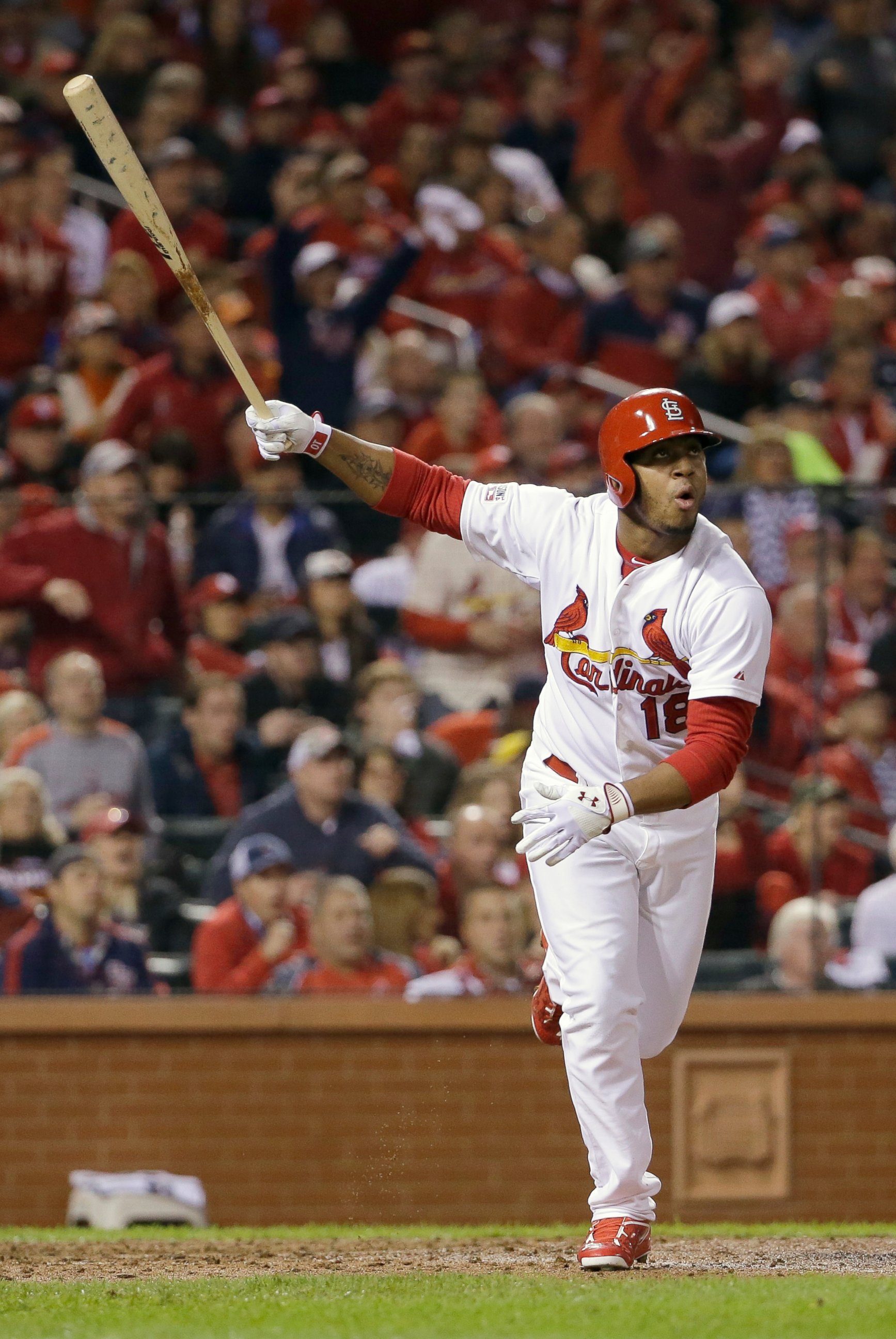 St. Louis Cardinals' Oscar Taveras hits a home run during the seventh inning in Game 2 of the National League baseball championship series against the San Francisco Giants, Oct. 12, 2014, in St. Louis.