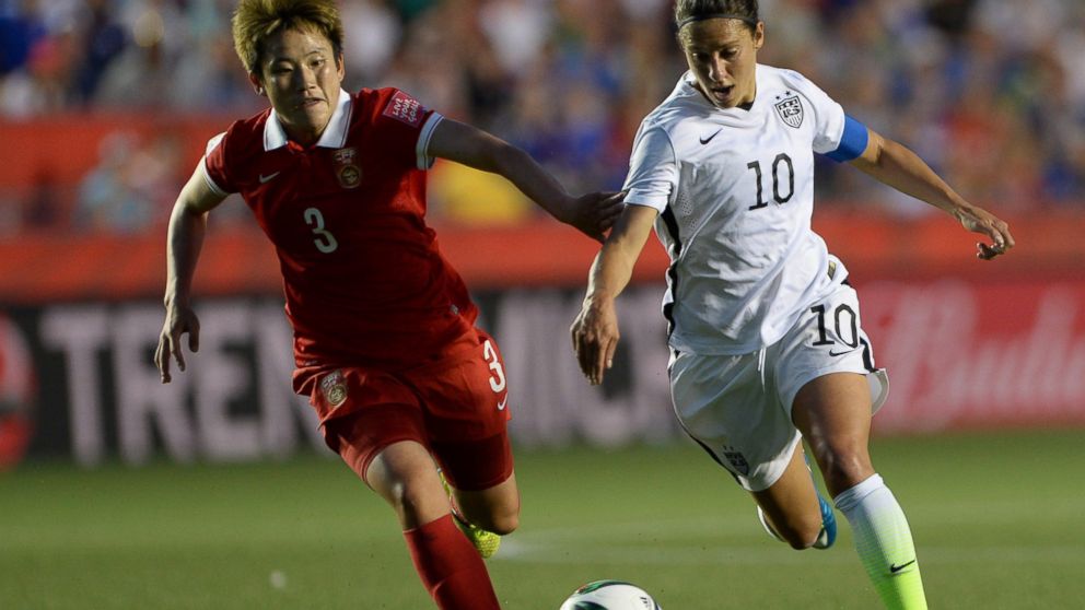 China's Pang Fengyue (3) chases United States' Carli Lloyd (10) during the second half of a quarterfinal match in the FIFA Women's World Cup soccer tournament, Friday, June 26, 2015, in Ottawa, Ontario, Canada.