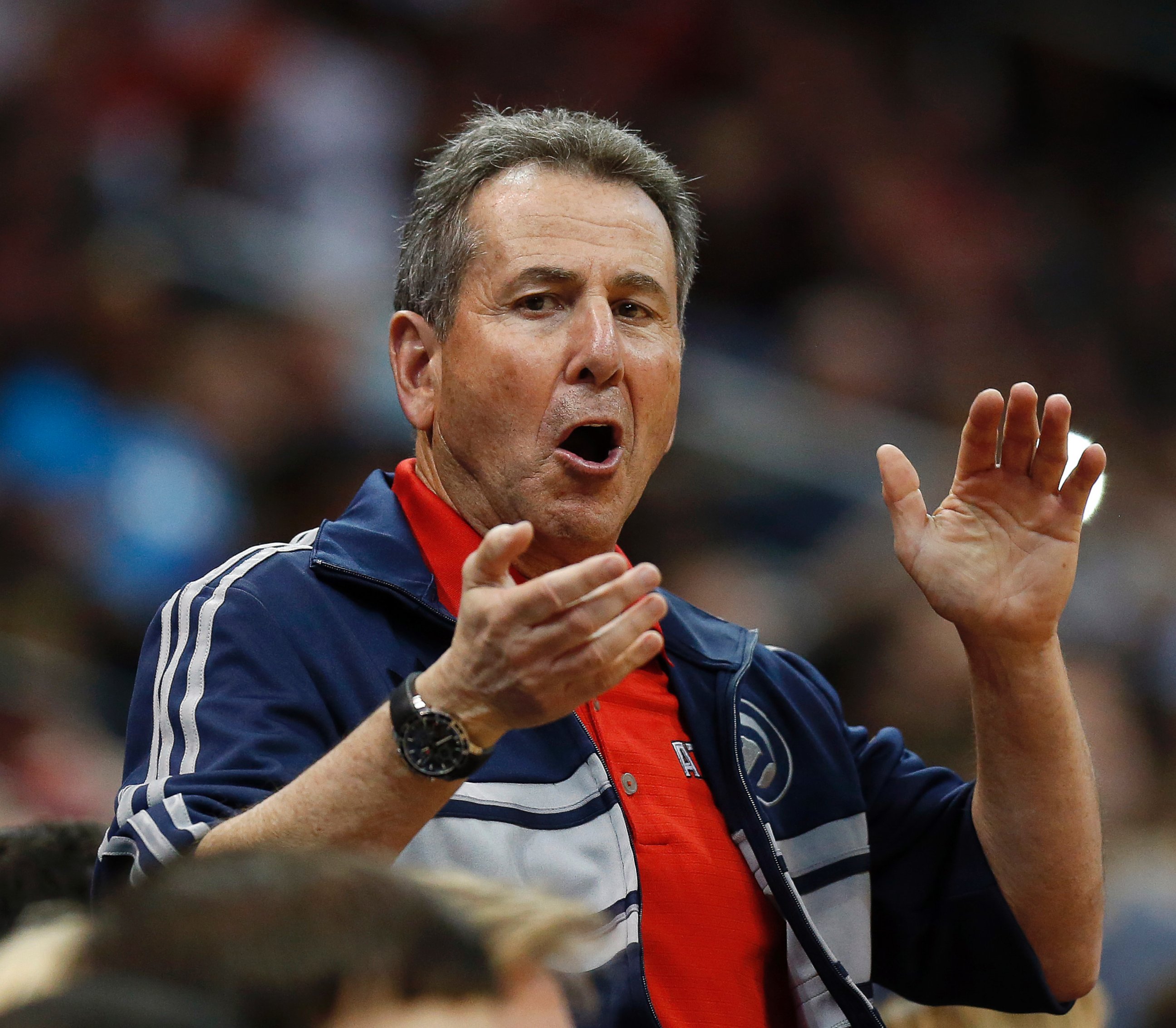 PHOTO: Atlanta Hawks co-owner Bruce Levenson cheers from the stands in the second half of Game 4 of an NBA basketball first-round playoff series against the Indiana Pacers in Atlanta, April 26, 2014. 