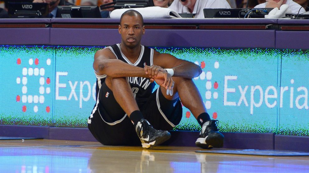 Brooklyn Nets center Jason Collins waits to come into the game during the second half of an NBA basketball game against the Los Angeles Lakers, Sunday, Feb. 23, 2014, in Los Angeles.