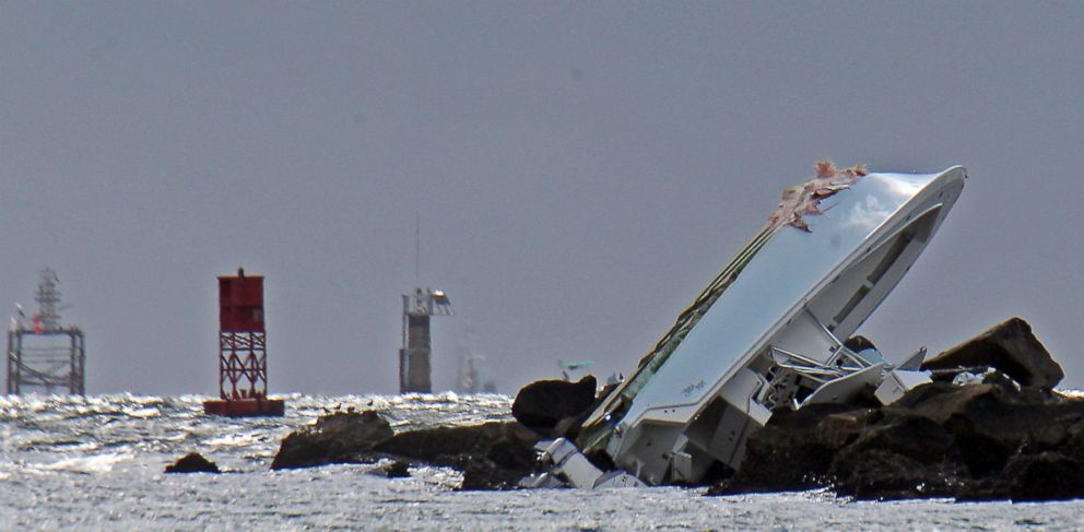 PHOTO: A boat lies overturned on a jetty, Sept. 25, 2016, off Miami Beach, Florida. Authorities said that Miami Marlins starting pitcher Jose Fernandez was one of three people killed in the boat crash early Sunday morning.