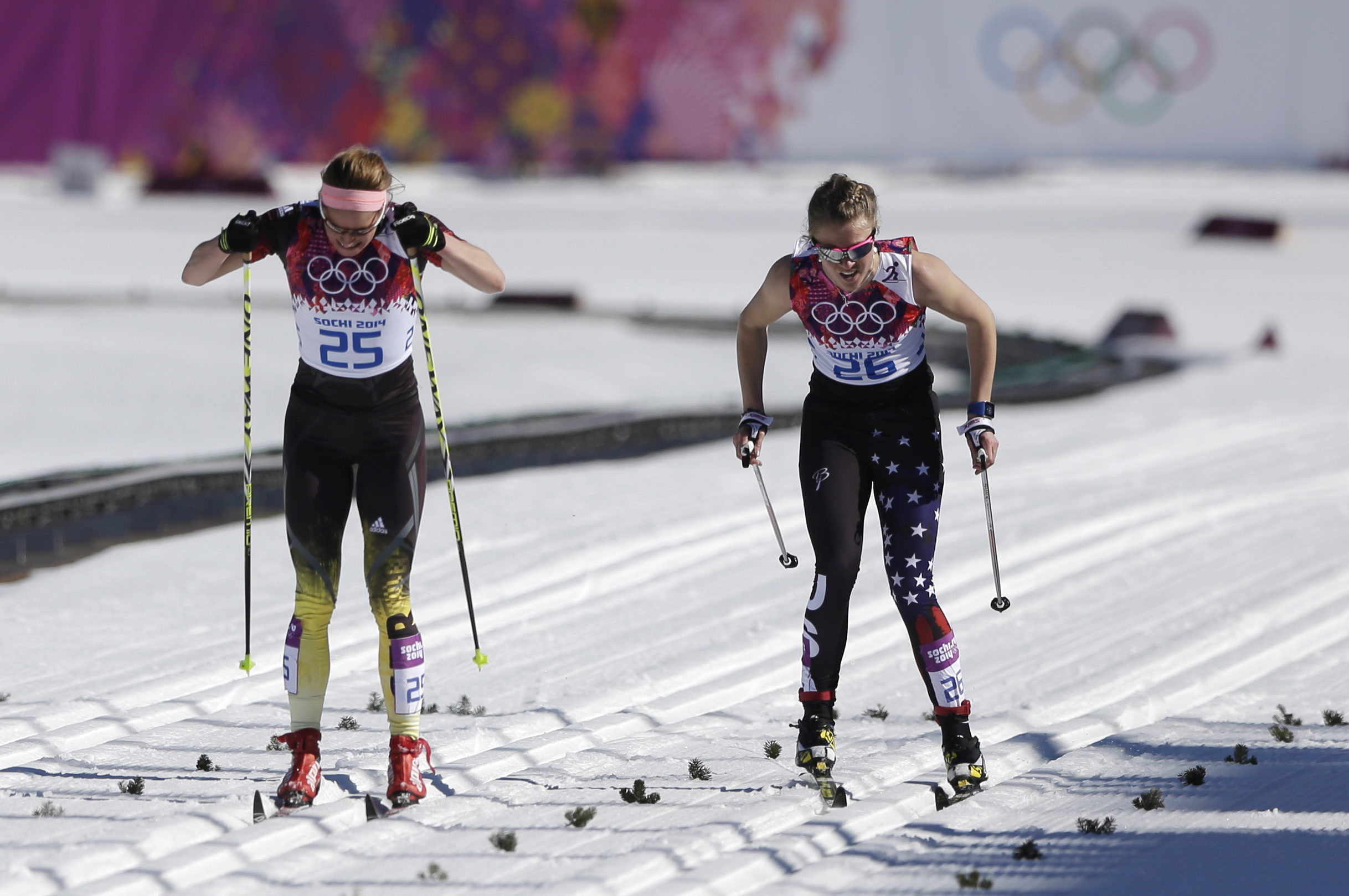 PHOTO: Germany's Nicole Fessel, left, and United States' Sadie Bjornsen ski on the finish straight during the women's 10K classical-style cross-country race at the 2014 Winter Olympics, Feb. 13, 2014, in Krasnaya Polyana, Russia