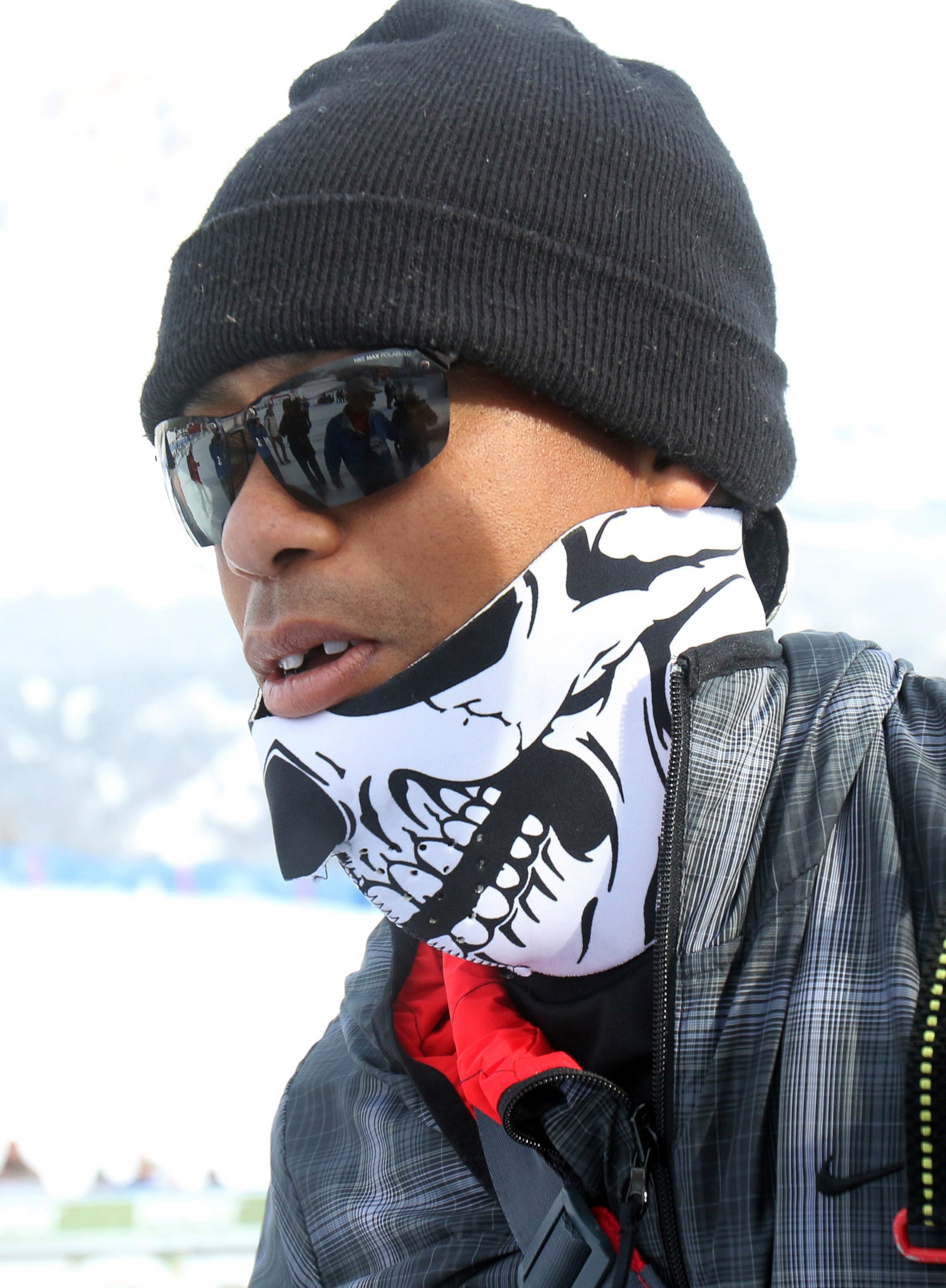 PHOTO: Tiger Woods walks in the finish area of the women's World Cup super-G