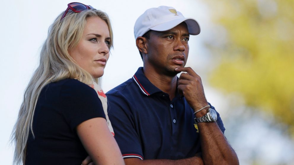 Tiger Woods and Lindsey Vonn are shown watching at the Presidents Cup golf tournament at Muirfield Village Golf Club in Dublin, Ohio, Oct. 3, 2013. 