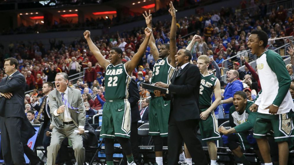 PHOTO: The UAB bench cheers after guard Robert Brown hit a 3-point basket in the closing seconds of the second half against Iowa State in the second round of the NCAA college basketball tournament in Louisville, Ky., March 19, 2015.