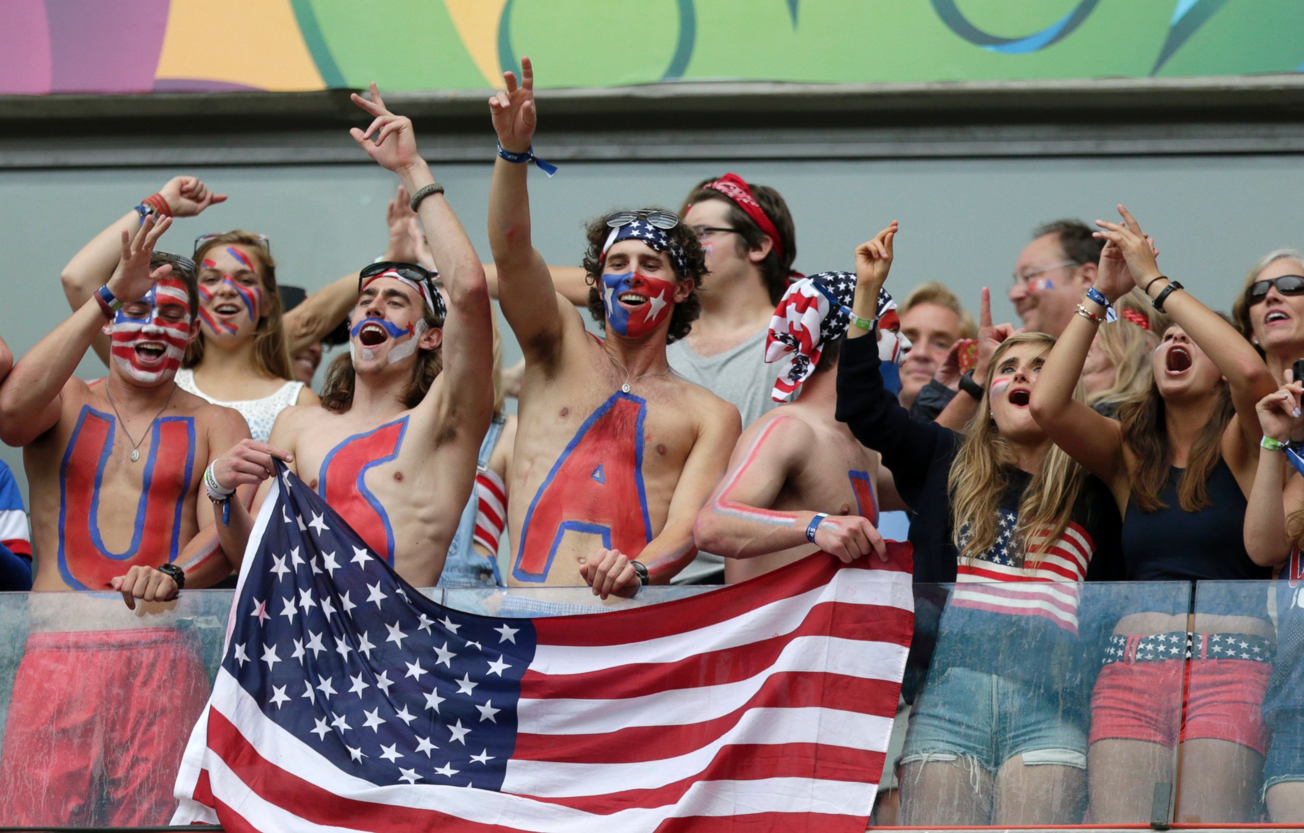 PHOTO: USA fans celebrate after team USA qualifying for the next World Cup round at the Arena Pernambuco in Recife, Brazil,  June 26, 2014. 
