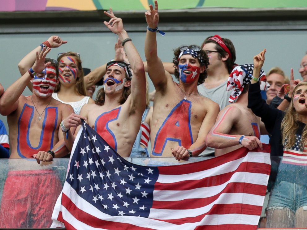 PHOTO: USA fans celebrate after team USA qualifying for the next World Cup round at the Arena Pernambuco in Recife, Brazil, June 26, 2014.