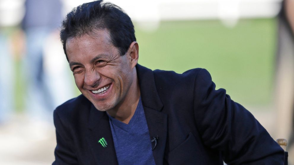 Jockey Victor Espinoza smiles at Belmont Park in Elmont, N.Y., Sunday, June 7, 2015. 