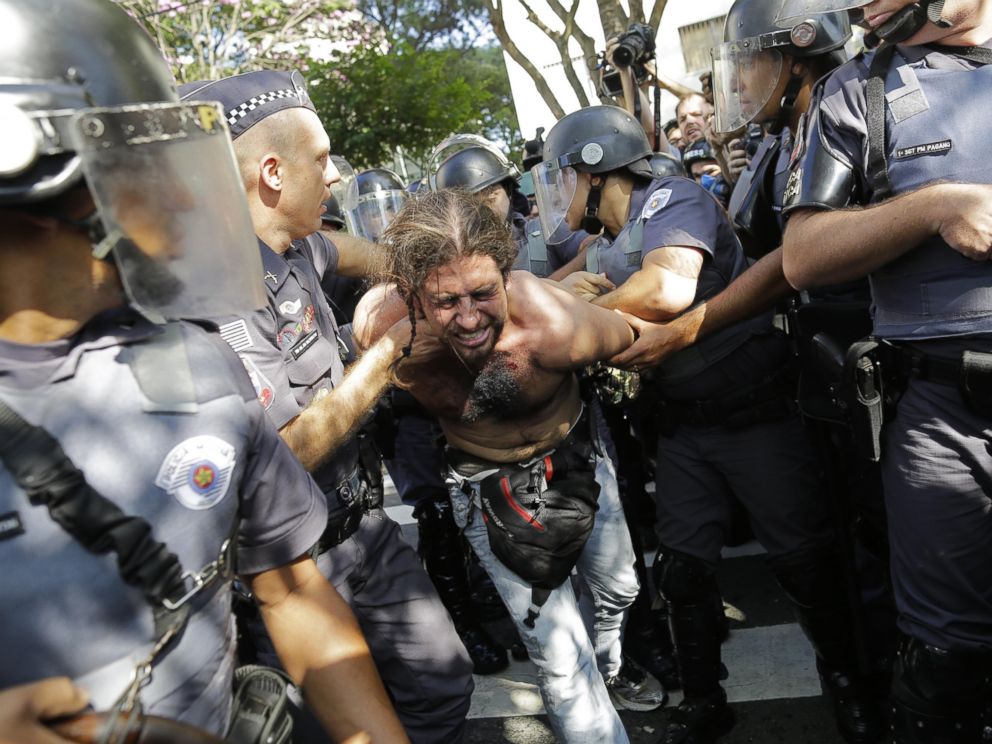 PHOTO: A protester is detained by police during a demonstration by people demanding better public services and against the money spent on the World Cup soccer tournament in Sao Paulo, Brazil, June 12, 2014.