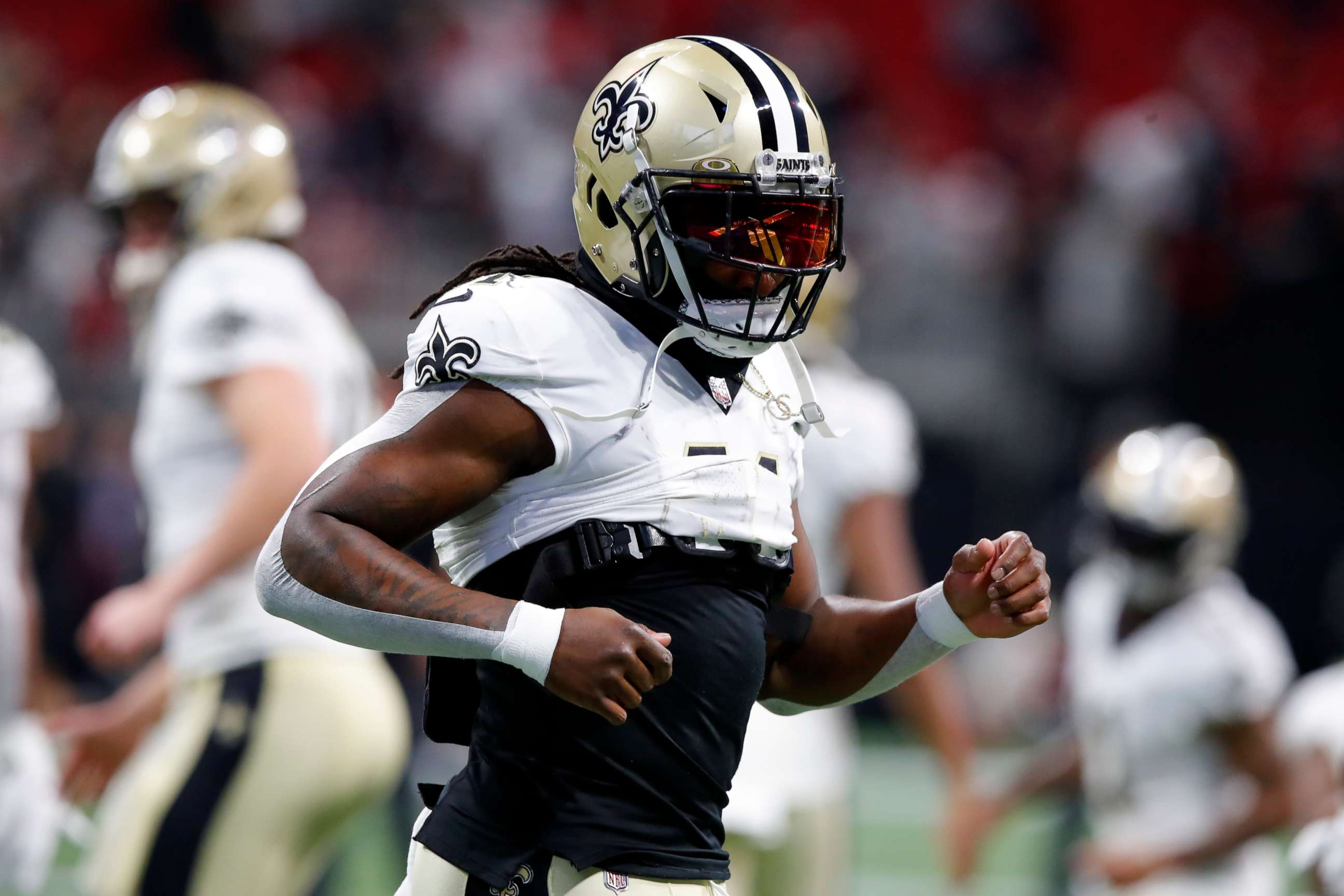 PHOTO: ATLANTA, GEORGIA - JANUARY 09: Alvin Kamara #41 of the New Orleans Saints warms up before the game against the Atlanta Falcons at Mercedes-Benz Stadium on January 09, 2022 in Atlanta, Georgia. (Photo by Todd Kirkland/Getty Images)