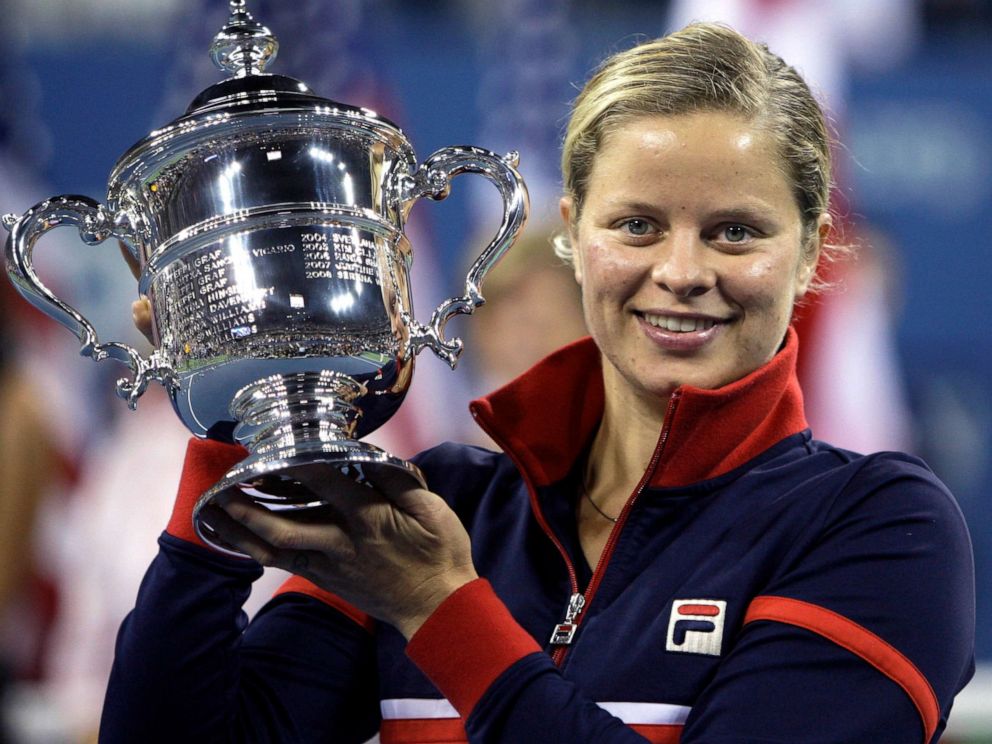 PHOTO: Kim Clijsters holds the trophy after winning the women's championship over Caroline Wozniacki, at the U.S. Open tennis tournament in New York, Sept. 13, 2009. 