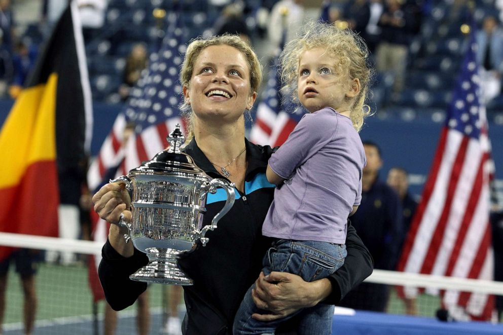 PHOTO: Kim Clijsters of Belgium and daughter Jada pose with the championship trophy after Clijsters defeated Vera Zvonareva of Russia during their women's singles final on day thirteen of the 2010 U.S. Open, Sept. 11, 2010 in New York.