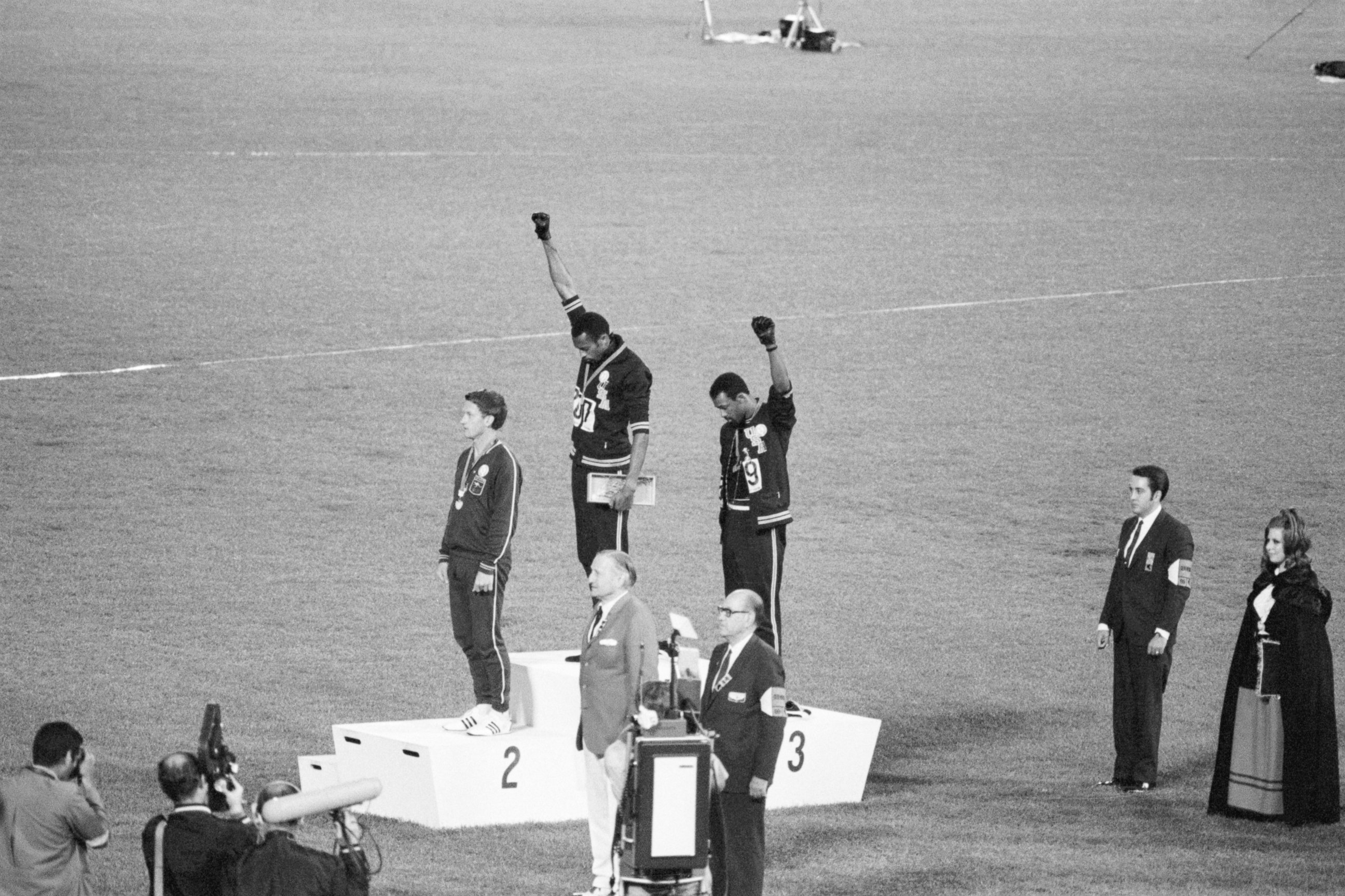 PHOTO: Tommie Smith and John Carlos, gold and bronze medalists in the 200-meter run at the 1968 Olympic Games, engage in a victory stand protest in 1968.