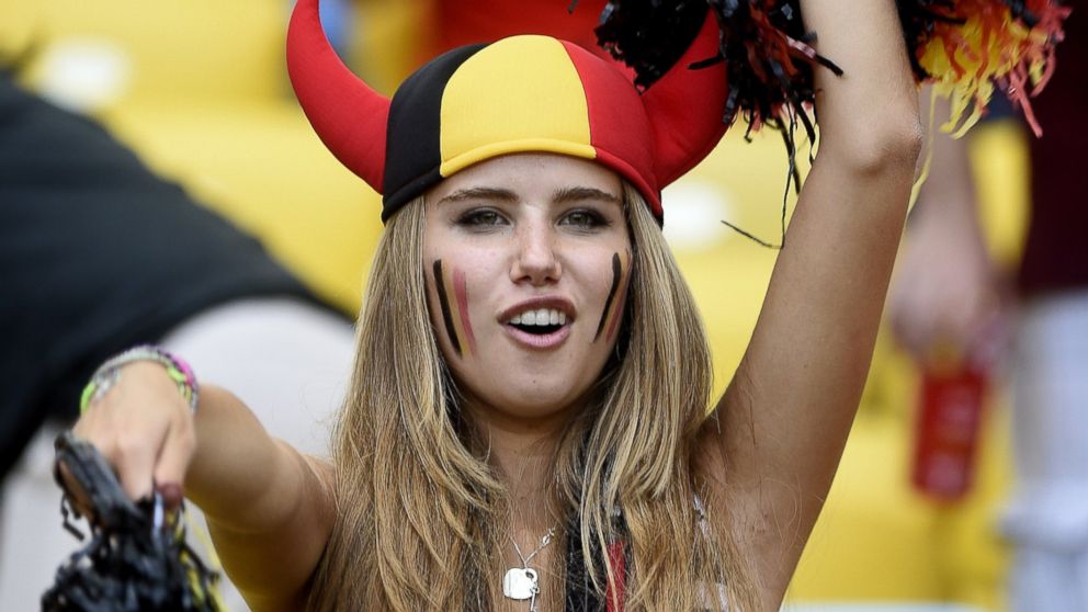 Axelle Despiegelaere, a Belgium fan poses as she waits for the start of the Group H football match between Belgium and Russia at the Maracana Stadium in Rio de Janeiro during the 2014 FIFA World Cup on June 22, 2014.   