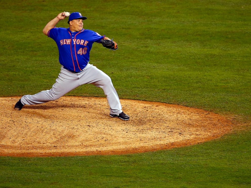 PHOTO: Bartolo Colon of the New York Mets throws a pitch in the twelfth inning against the Kansas City Royals during Game One of the 2015 World Series at Kauffman Stadium on October 27, 2015 in Kansas City, Missouri.