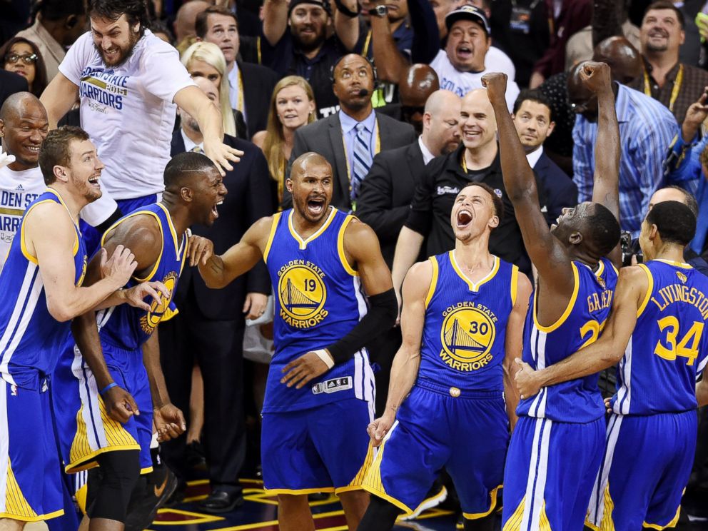 PHOTO: The Golden State Warriors celebrate their 105-97 win over the Cleveland Cavaliers in Game 6 of the 2015 NBA Finals at Quicken Loans Arena on June 16, 2015 in Cleveland, Ohio.