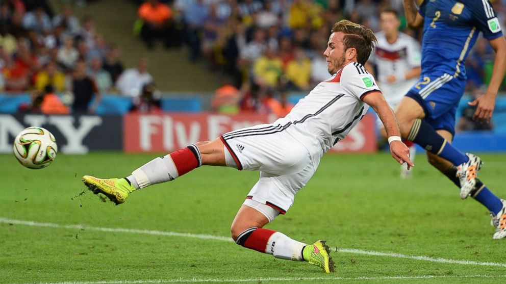 Mario Goetze of Germany scores his team's first goal in extra time during the 2014 FIFA World Cup Brazil Final match between Germany and Argentina at Maracana on July 13, 2014 in Rio de Janeiro, Brazil.