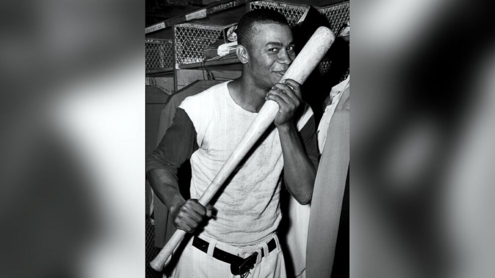 PHOTO: Larry Doby of the Cleveland Indians kisses the bat with which he hit a home run in game four of the 19448 World Series against the Boston Braves on October 9, 1948 at Cleveland Stadium in Cleveland, Ohio. Cleveland won game four 2-1. 