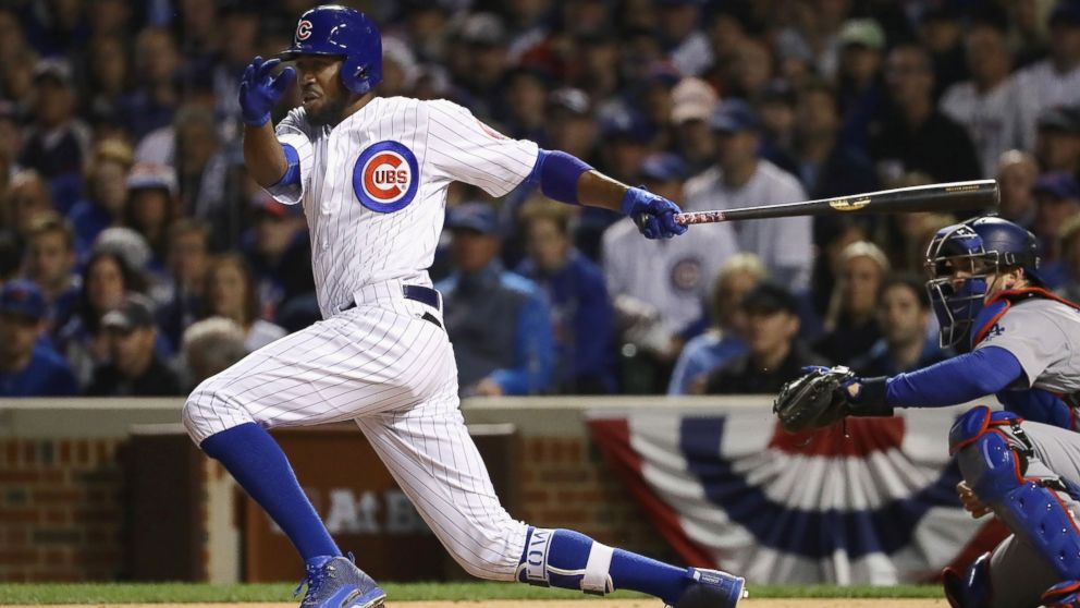 PHOTO: Dexter Fowler of the Chicago Cubs hits an RBI single in the second inning against the Los Angeles Dodgers during game six of the National League Championship Series at Wrigley Field on October 22, 2016 in Chicago, Ill. 