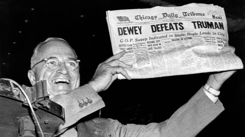 PHOTO: President Harry Truman holds up a copy of the Chicago Daily Tribune declaring his defeat to Thomas Dewey in the presidential election, St Louis, Missouri, November 1948.