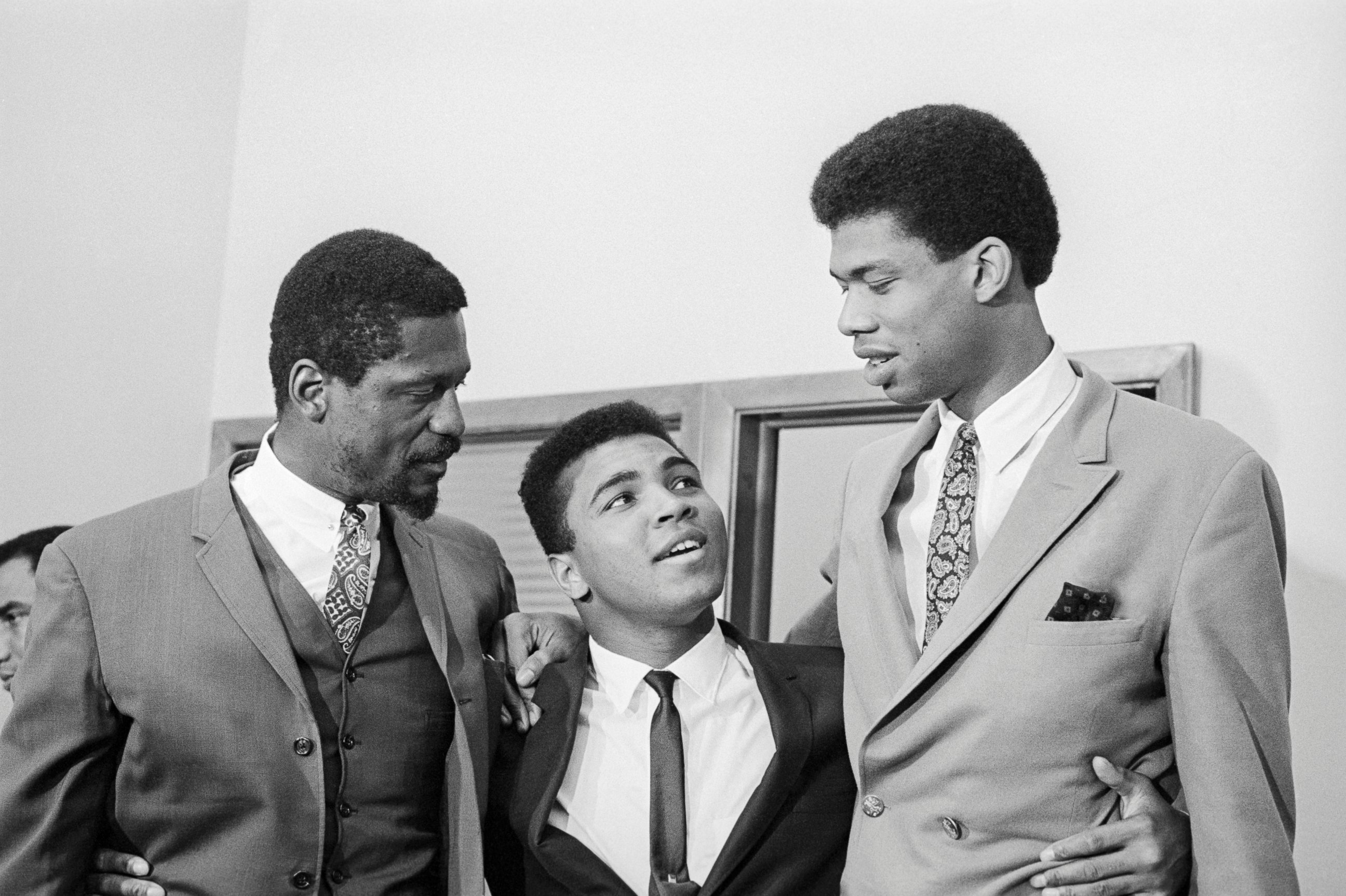 PHOTO: Bill Russell, left, Cassius Clay and Lew Alcindor, later Kareem Abdul-Jabbar, speak at a press conference rejecting US Army induction, June 1967.
