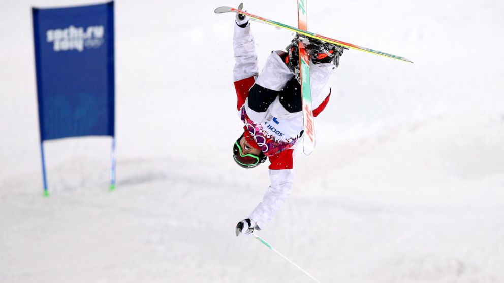 Alex Bilodeau of Canada competes in the Men's Moguls Finals on day three of the Sochi 2014 Winter Olympics at Rosa Khutor Extreme Park in Sochi, Russia, Feb. 10, 2014.