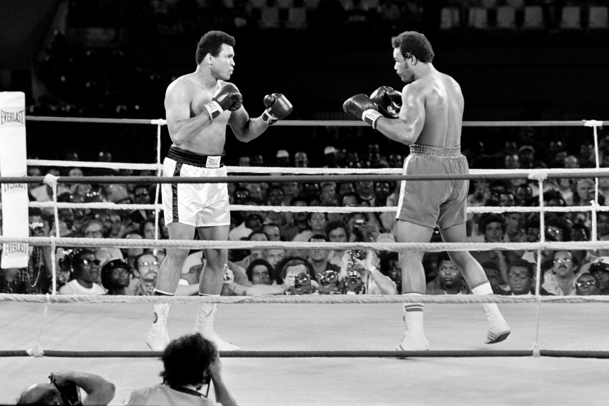 PHOTO: Heavyweight champions, Muhammad Ali, born Cassius Clay, left, and George Foreman in the ring in Kinshasa, Oct. 30, 1974.
