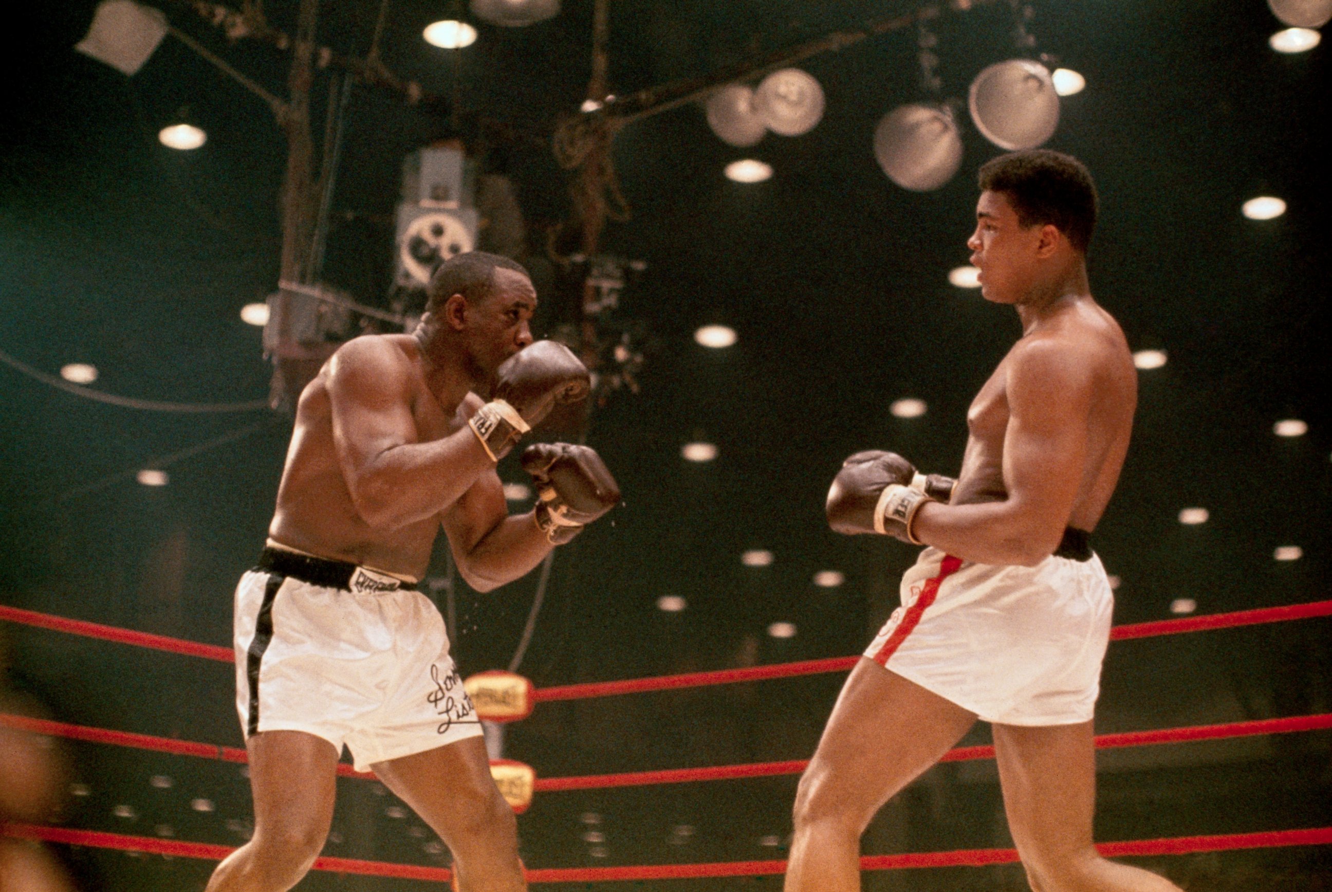 PHOTO: World Heavyweight boxing title bout between champ Sonny Liston, left, and challenger Cassius Clay, aka Muhammad Ali.
