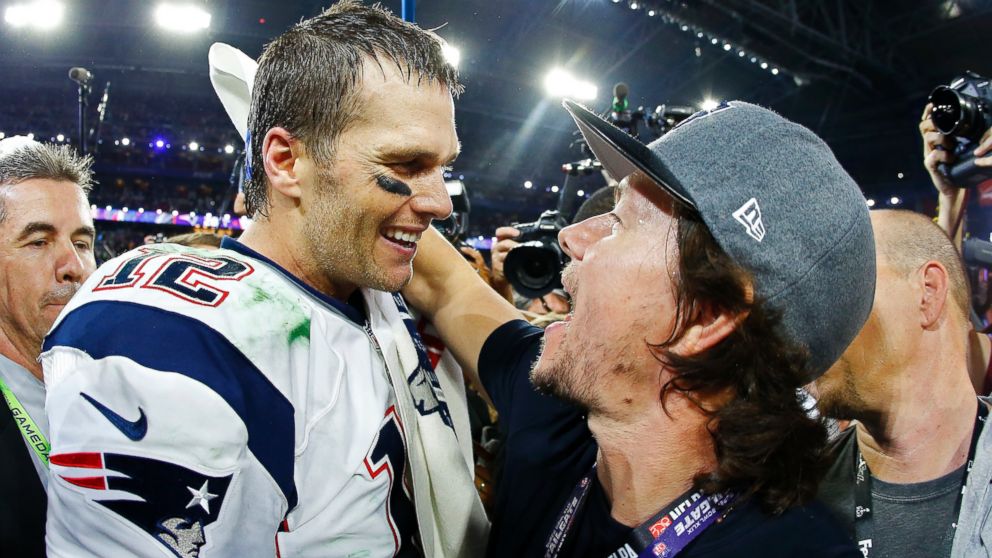 Tom Brady of the New England Patriots celebrates with Mark Wahlberg after defeating the Seattle Seahawks 28-24 to win Super Bowl XLIX at University of Phoenix Stadium, Feb. 1, 2015 in Glendale, Ariz. 