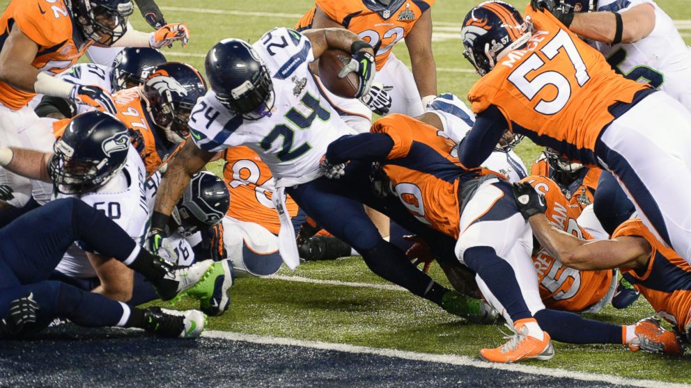 PHOTO: Marshawn Lynch #26 of the Seattle Seahawks scores on a one yard touchdown run 