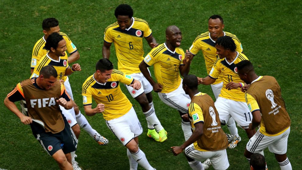 PHOTO: James Rodriguez #10 of Colombia celebrates by dancing with teammates after scoring his team's first goal during the 2014 FIFA World Cup Brazil Group C match between Colombia and Cote D'Ivoire at Estadio Nacional on June 19, 2014. 