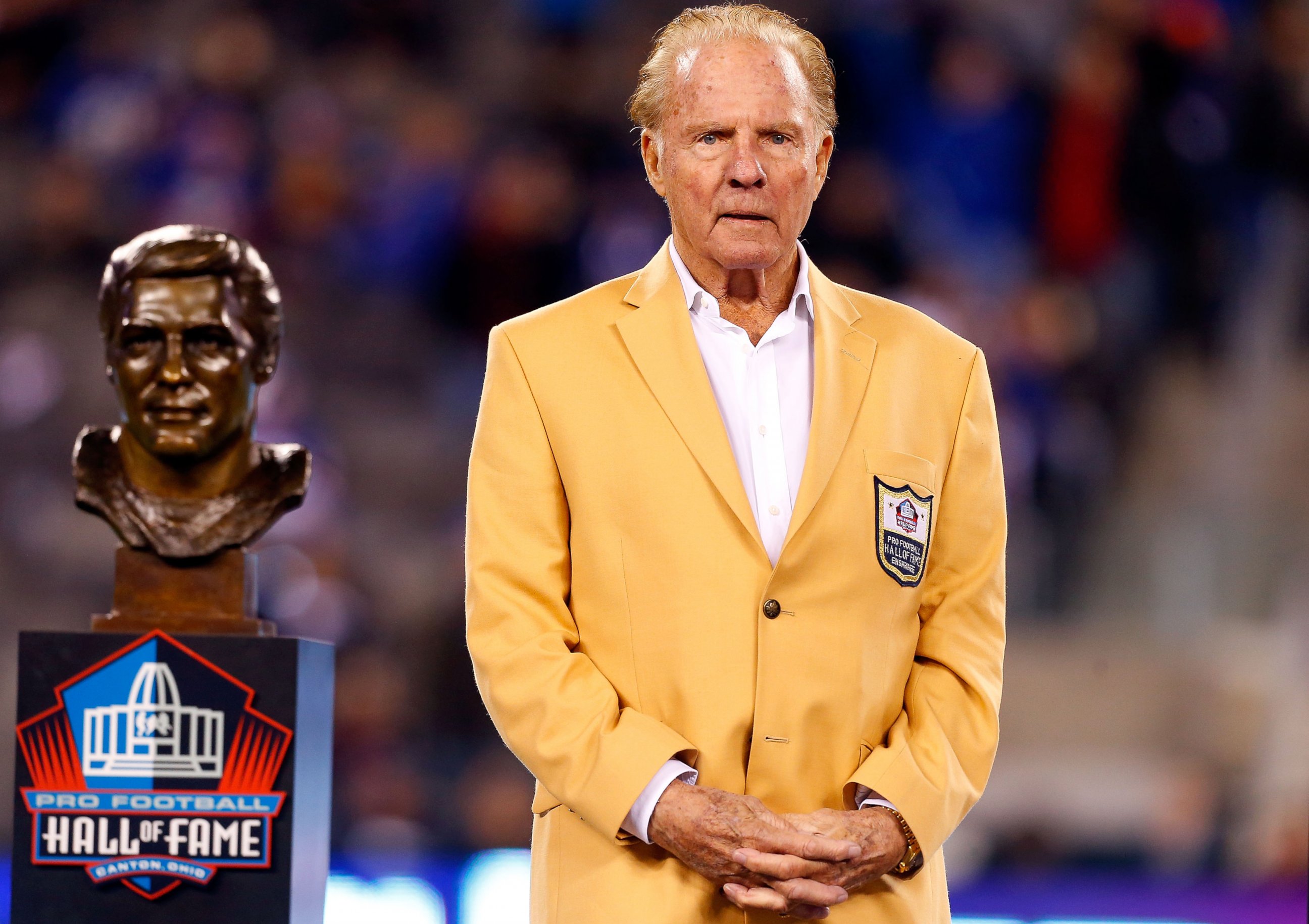 PHOTO: Hall of Famer Frank Gifford looks on during a halftime ceremony of a game between the New York Giants and the Indianapolis Colts at MetLife Stadium in East Rutherford, N.J., Nov. 3, 2014. 