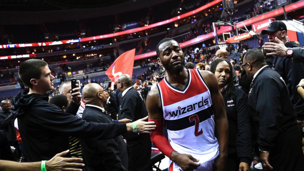 An emotional John Wall leaves the court after winning the game between the Washington Wizards and the Boston Celtics on Dec. 8, 2014 in Washington, D.C. Wall was upset over the loss of his young friend Damiyah Telemaque-Nelson, who lost her battle with Burkitt's lymphoma. 