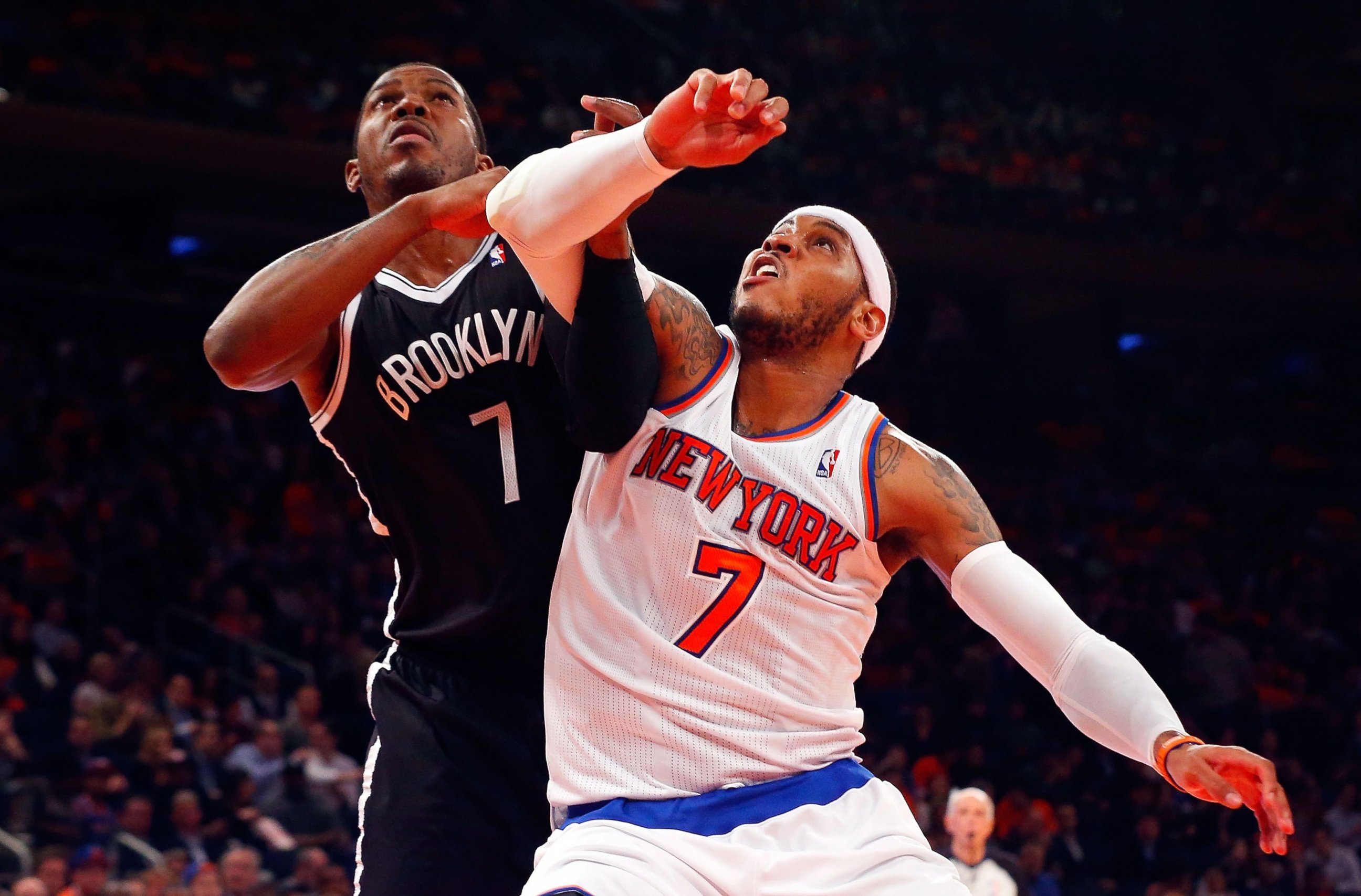 PHOTO: Carmelo Anthony #7 of the New York Knicks in action against Joe Johnson #7 of the Brooklyn Nets at Madison Square Garden in this April 2, 2014, file photo in New York City. 