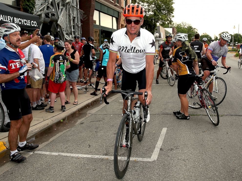 PHOTO: Lance Armstrong departs at the start of the third day of the RAGBRAI en route to West Des Moines, July 23, 2013, in Perry, Iowa.