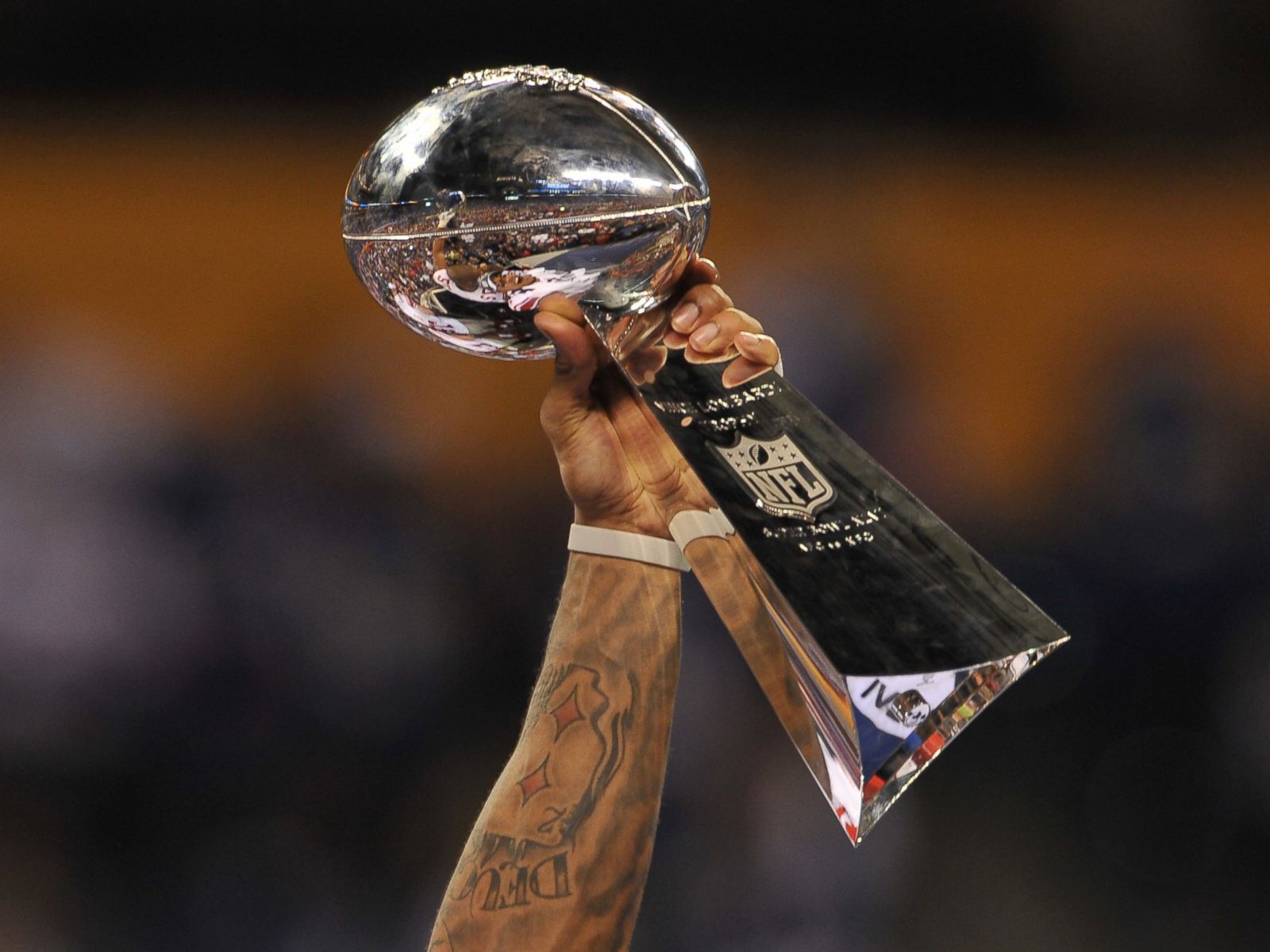 Image result for hoisting the lombardi trophy pics