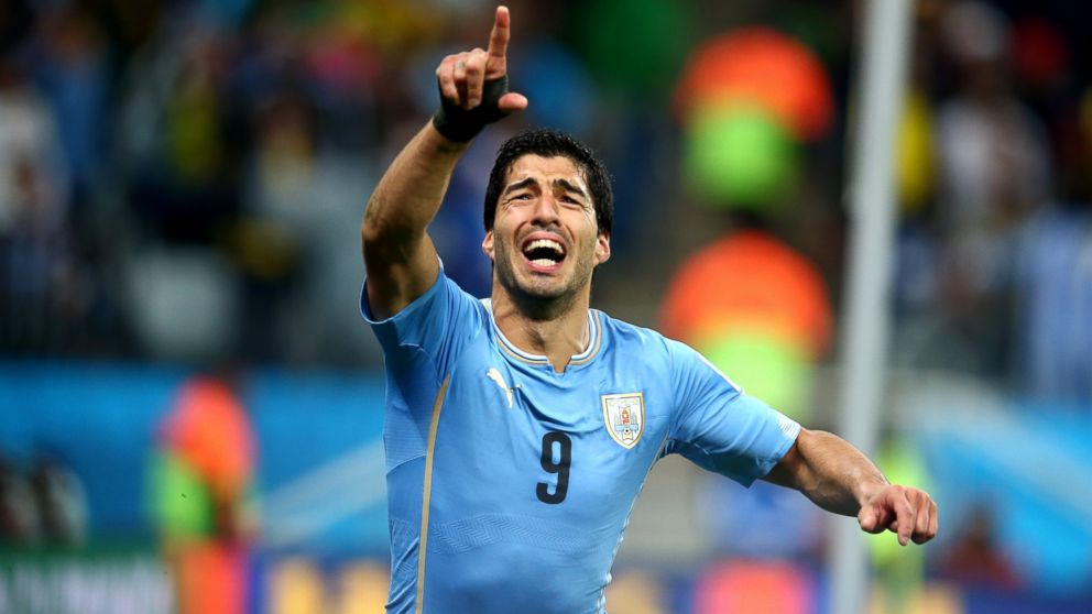 Luis Suarez of Uruguay celebrates after scoring his team's second goal during the 2014 FIFA World Cup Brazil Group D match between Uruguay and England at Arena de Sao Paulo in Sao Paulo, Brazil, June 19, 2014.