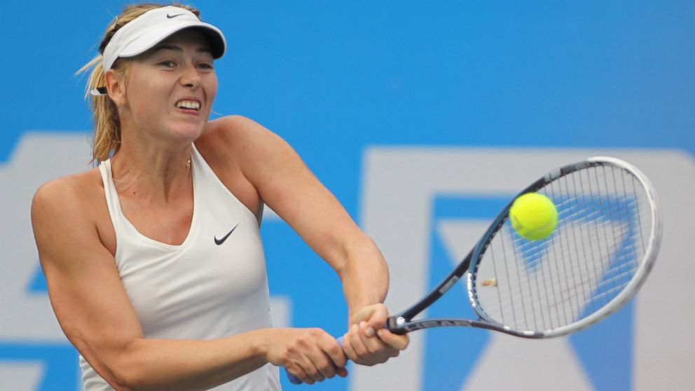 Maria Sharapova of Russia returns a shot during her match against Timea Bacsinszky of Switzerland on day four of 2014 Dongfeng Motor Wuhan Open at Optics Valley International Tennis Center on Sept. 24, 2014 in Wuhan, China. 