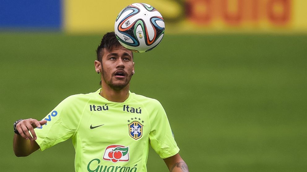 Neymar juggles with a ball during a training session of the Brazilian national football team at the squad's Granja Comary training complex, in Teresopolis, May 28, 2014 in Teresopolis, Brazil.