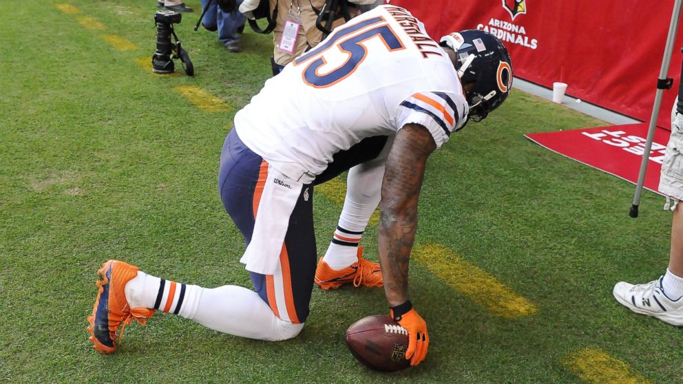 PHOTO: Brandon Marshall #15 of the Chicago Bears kneels at the back of the end zone after scoring a touchdown against the Arizona Cardinals at University of Phoenix Stadium, Dec. 23, 2012, in Glendale, Ariz.
