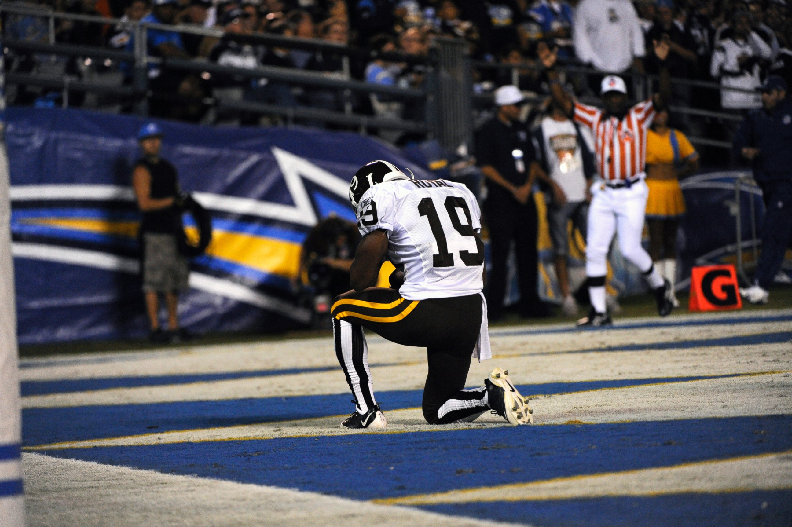 PHOTO: The Denver Broncos Eddie Royal kneels in the end zone after scoring his 2nd runback for a touchdown vs. the San Diego Chargers at Qualcomm Stadium in San Diego, Oct. 19, 2009.