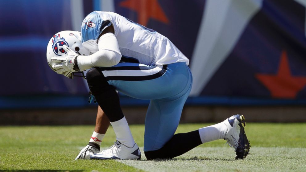 PHOTO: Nate Washington #85 of the Tennessee Titans kneels down after catching a touchdown pass in the first half against the Oakland Raiders during the NFL season opener at LP Field, Sept. 12, 2010, in Nashville, Tenn.
