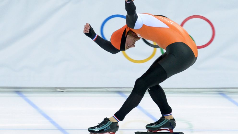 PHOTO: Netherlands' Michel Mulder celebrates after the Men's Speed Skating 500m. 