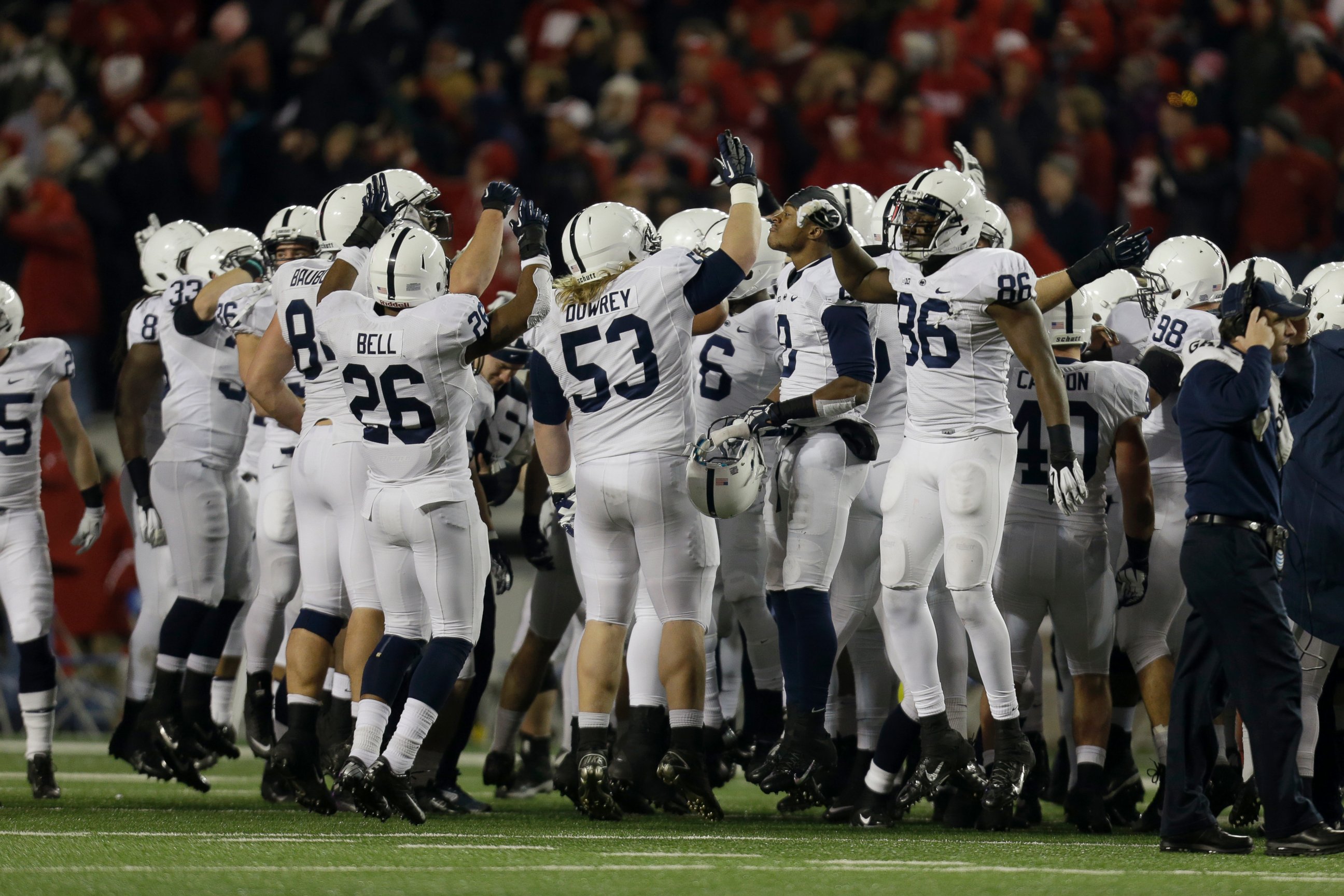PHOTO: The Penn State Nittany Lions dance on the field during the playing of "Jump Around" during the game against the Wisconsin Badgers at Camp Randall Stadium on Nov. 30, 2013 in Madison, Wis.