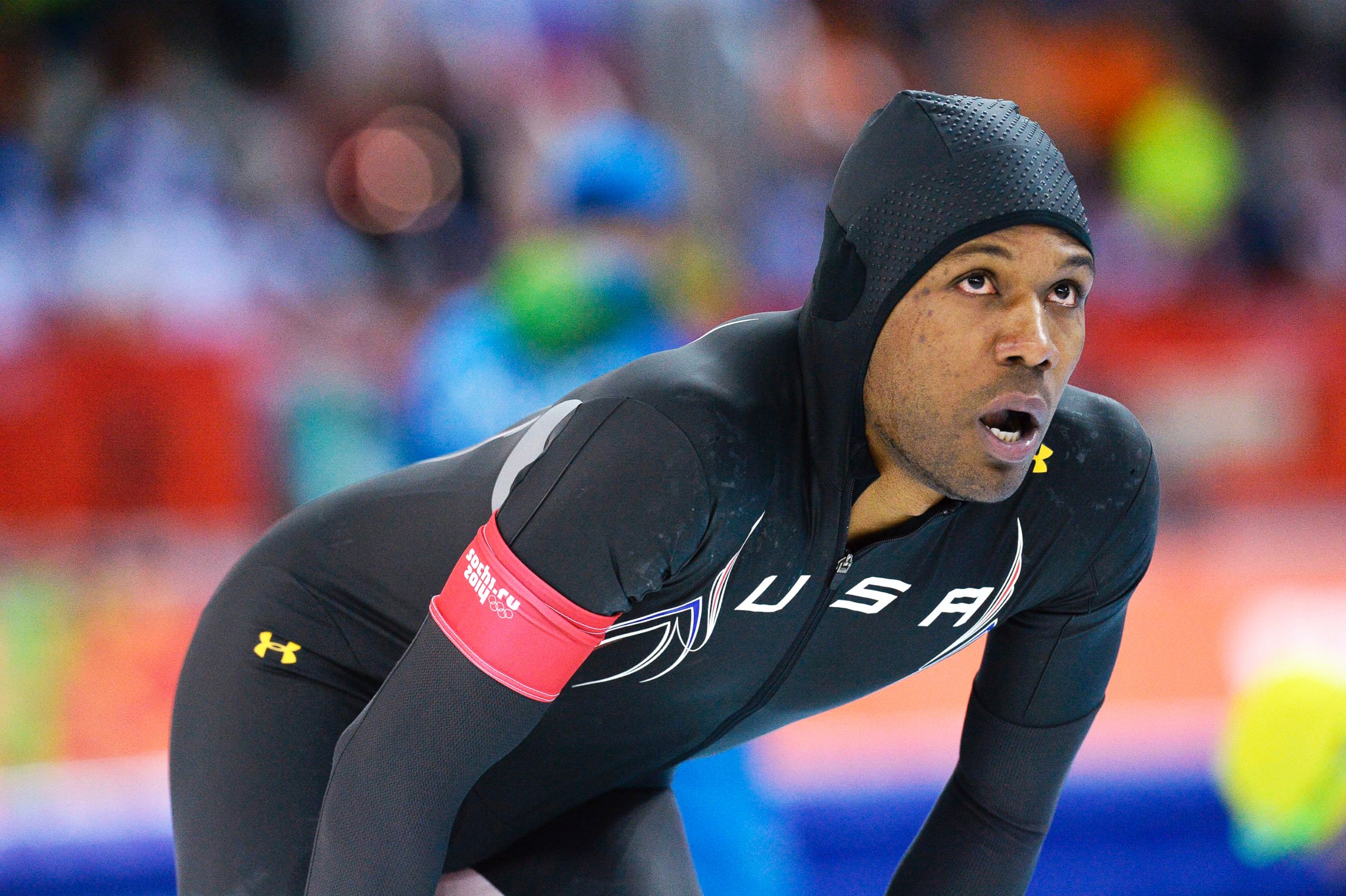 PHOTO: U.S. speed skater Shani Davis looks to the clock at the finish of the men's 1000-meters event during the Winter Olympics Feb. 12, 2014.  