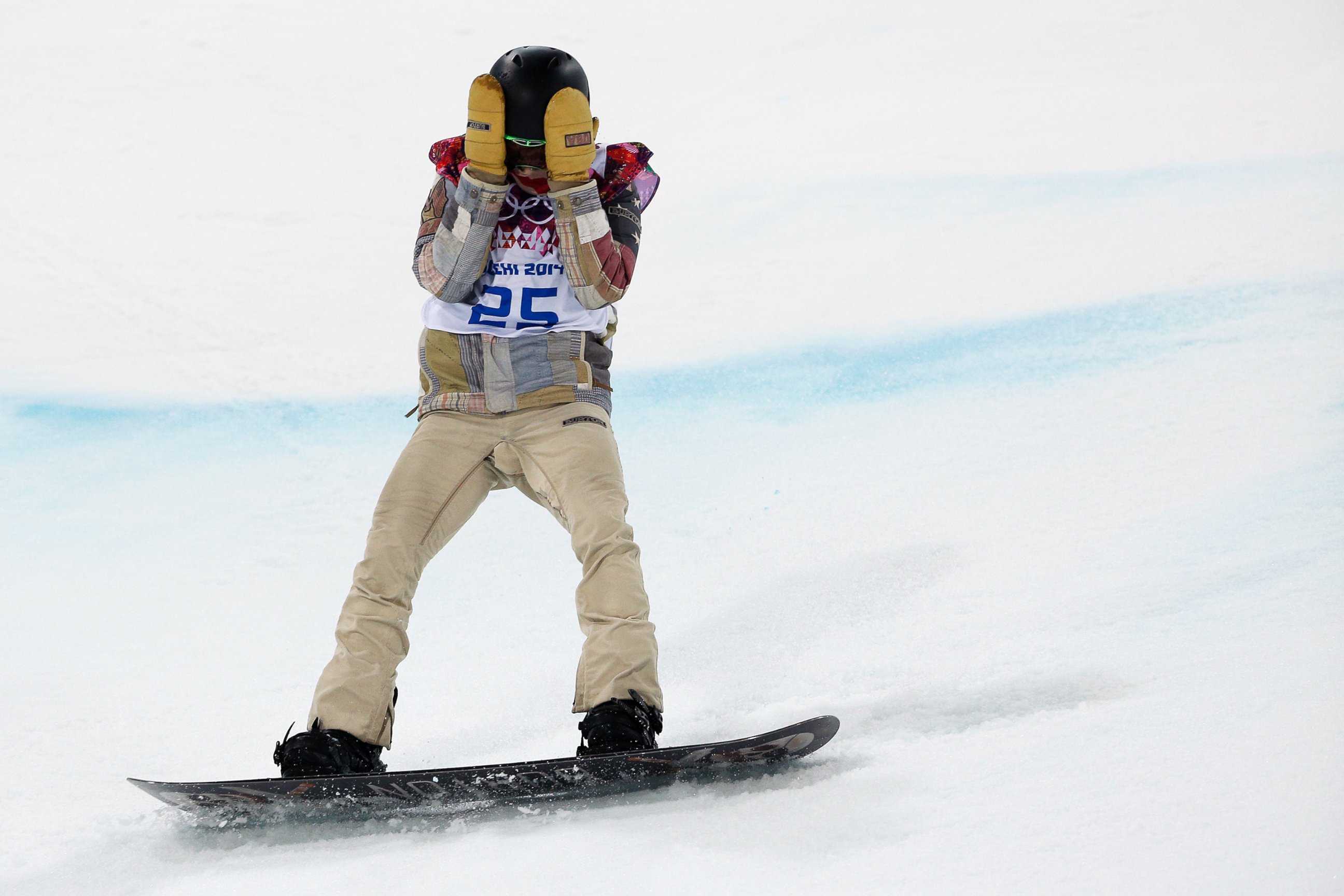 PHOTO: Shaun White reacts to his finish during the Men's Snowboarding Halfpipe Final on Feb. 12,  2014. 