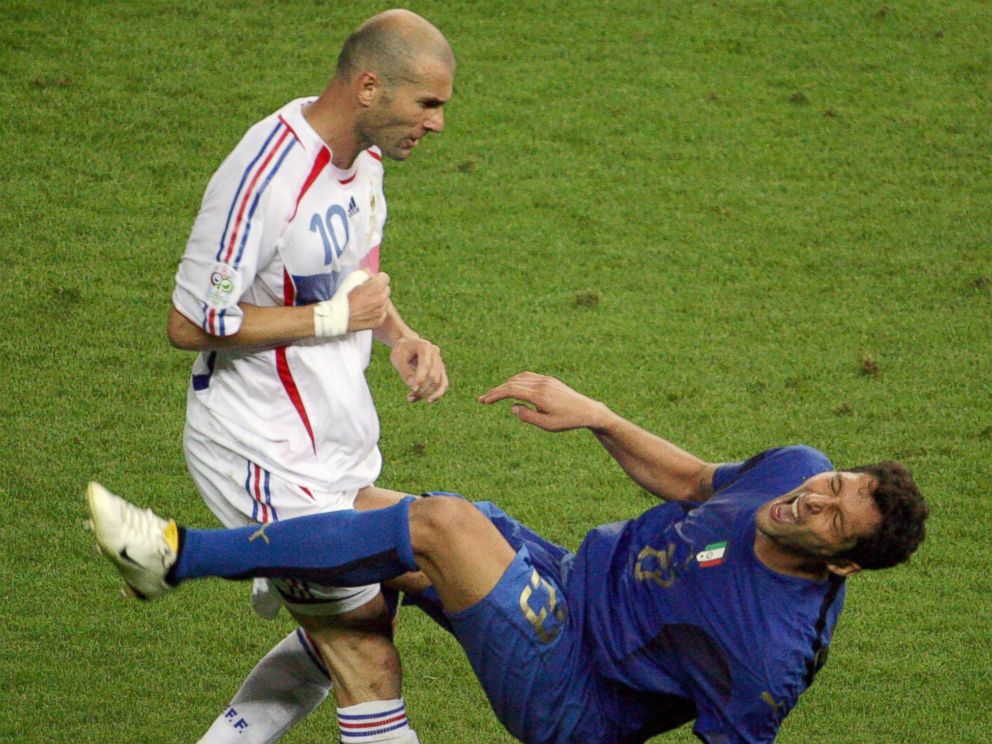 PHOTO: French midfielder Zinedine Zidane, left, gestures after head-butting Italian defender Marco Materazzi, right, during the 2006 World Cup on July 9, 2006 in Berlin, Germany.